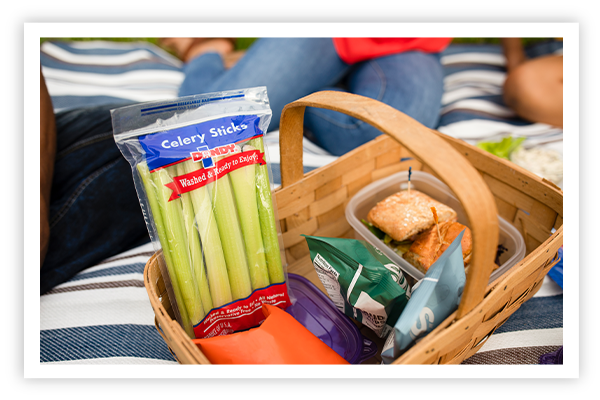 package of Dandy celery sticks in picnic basket